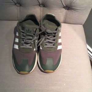 Adidas olive green running shoe